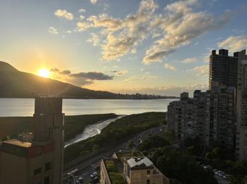 雪梨高樓夕陽河景戶